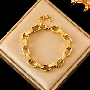 Pulseira Feminina de Aço Inoxidável Torcida Banhada a Ouro 18k