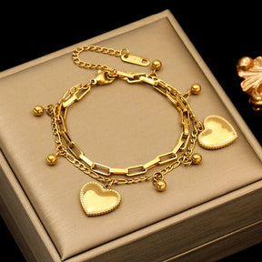 Pulseira Feminina de Aço Inoxidável Torcida Banhada a Ouro 18k